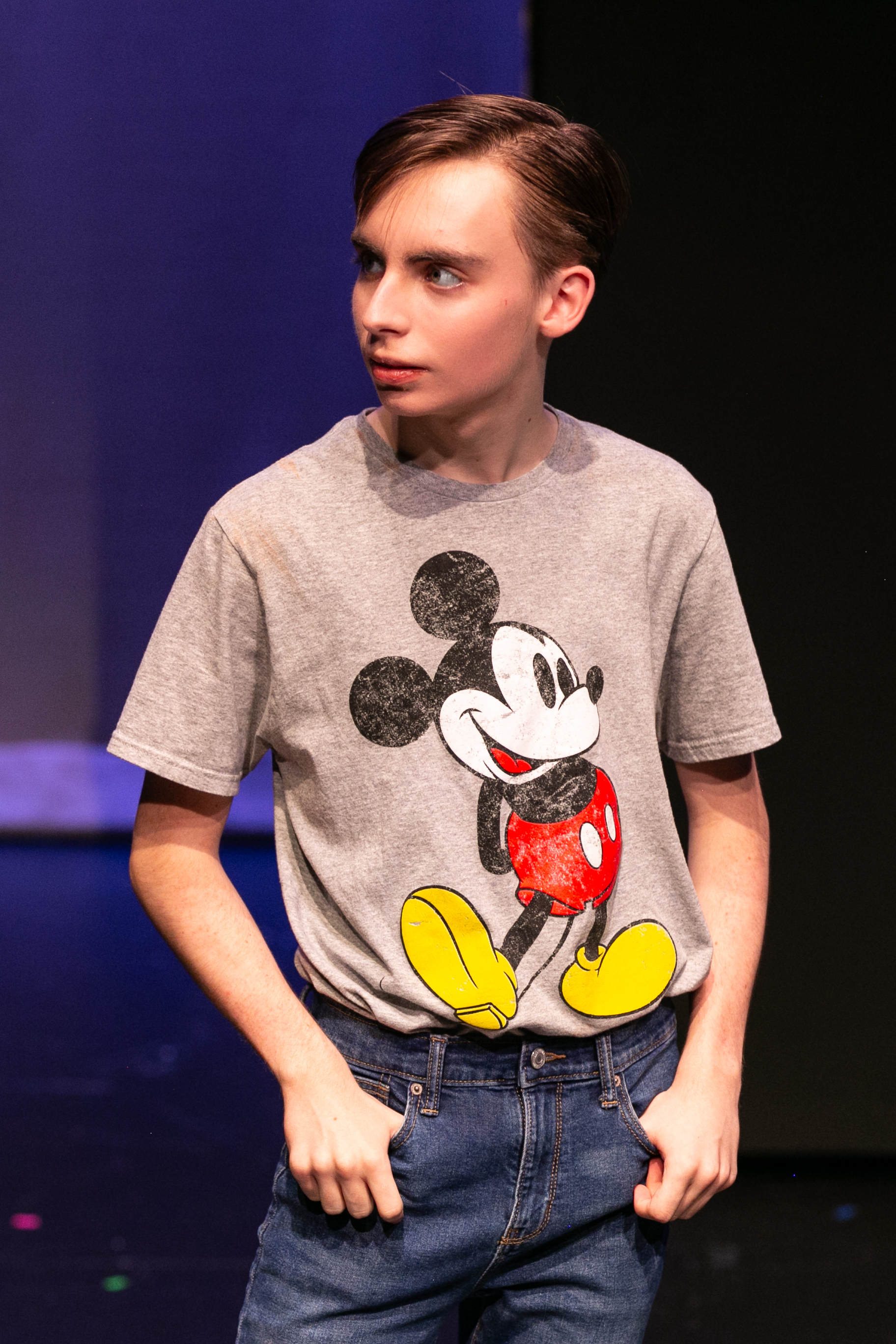 Van on stage in a vintage Mickey Mouse tee