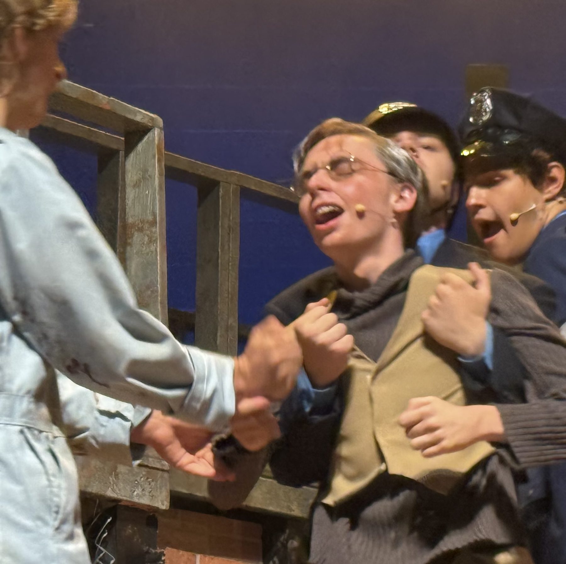 Ensemble scene, dramatic stage lighting